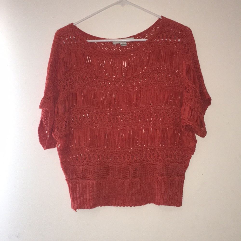 Bright orange knitted sweater